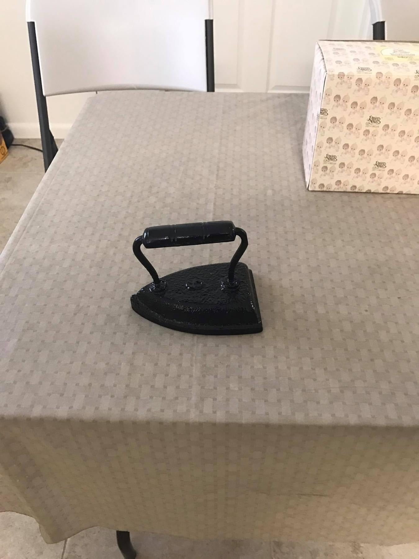 Old fashion, cast-iron iron