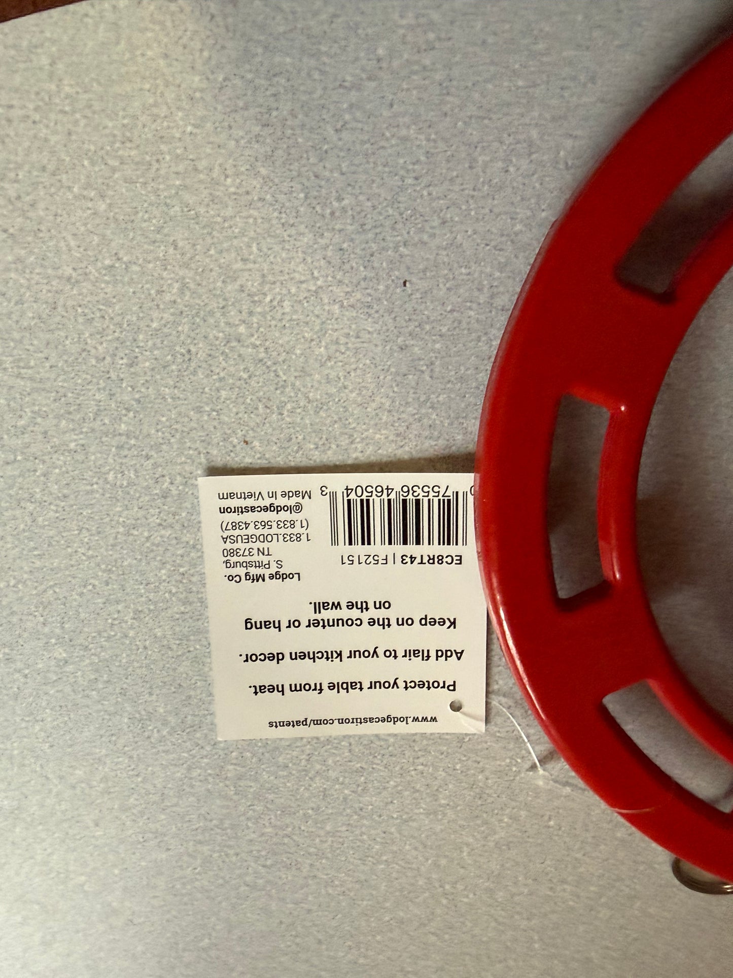 Red Cast iron Trivet